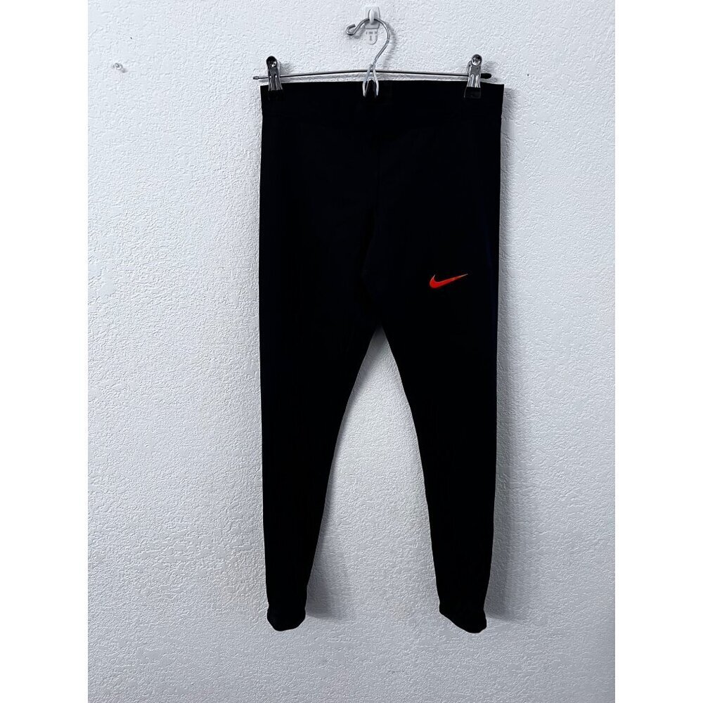 Nike dri fit black legging with orange swish logo women size medium